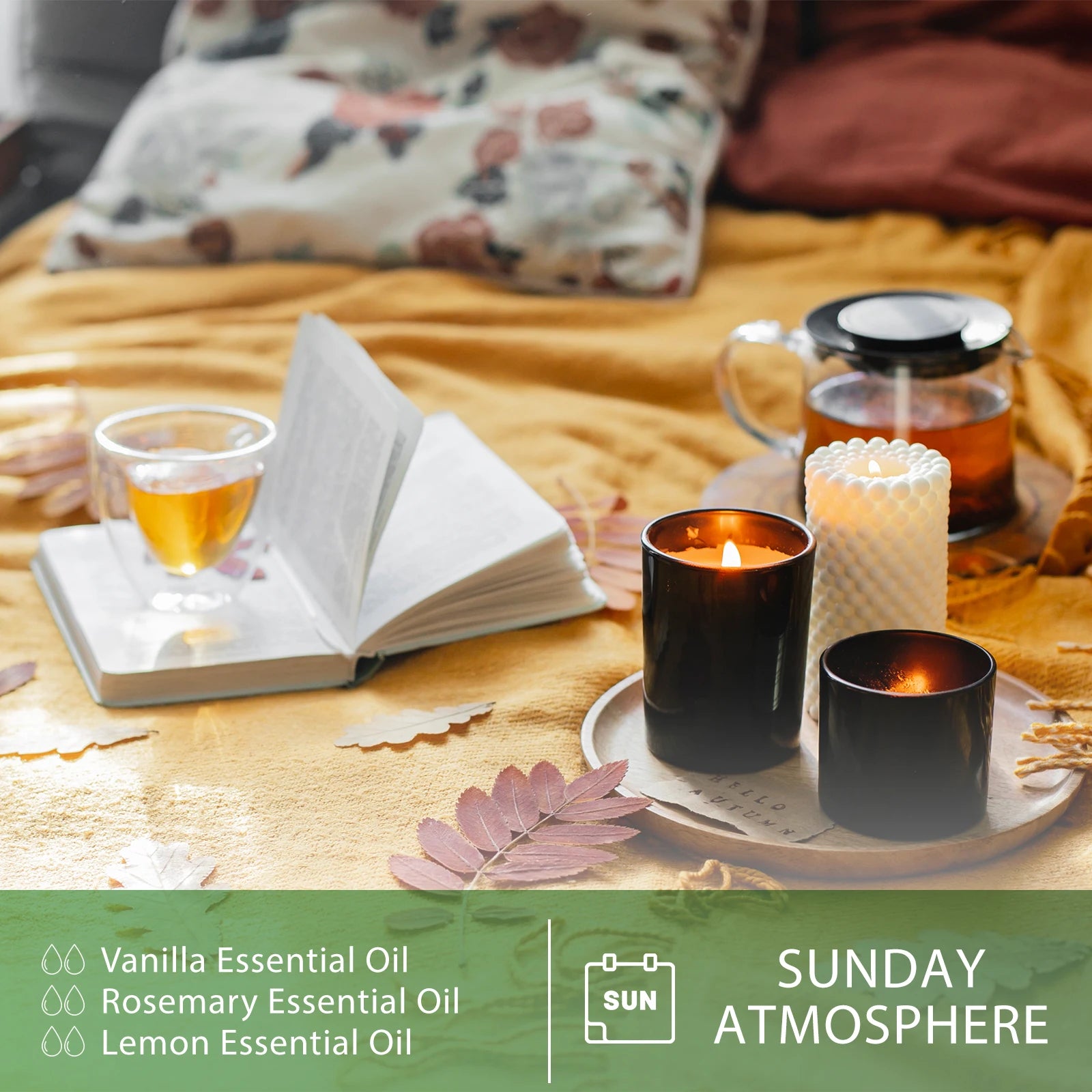 Candlelit scene with a book, tea, and vanilla essential oil on a wooden surface.